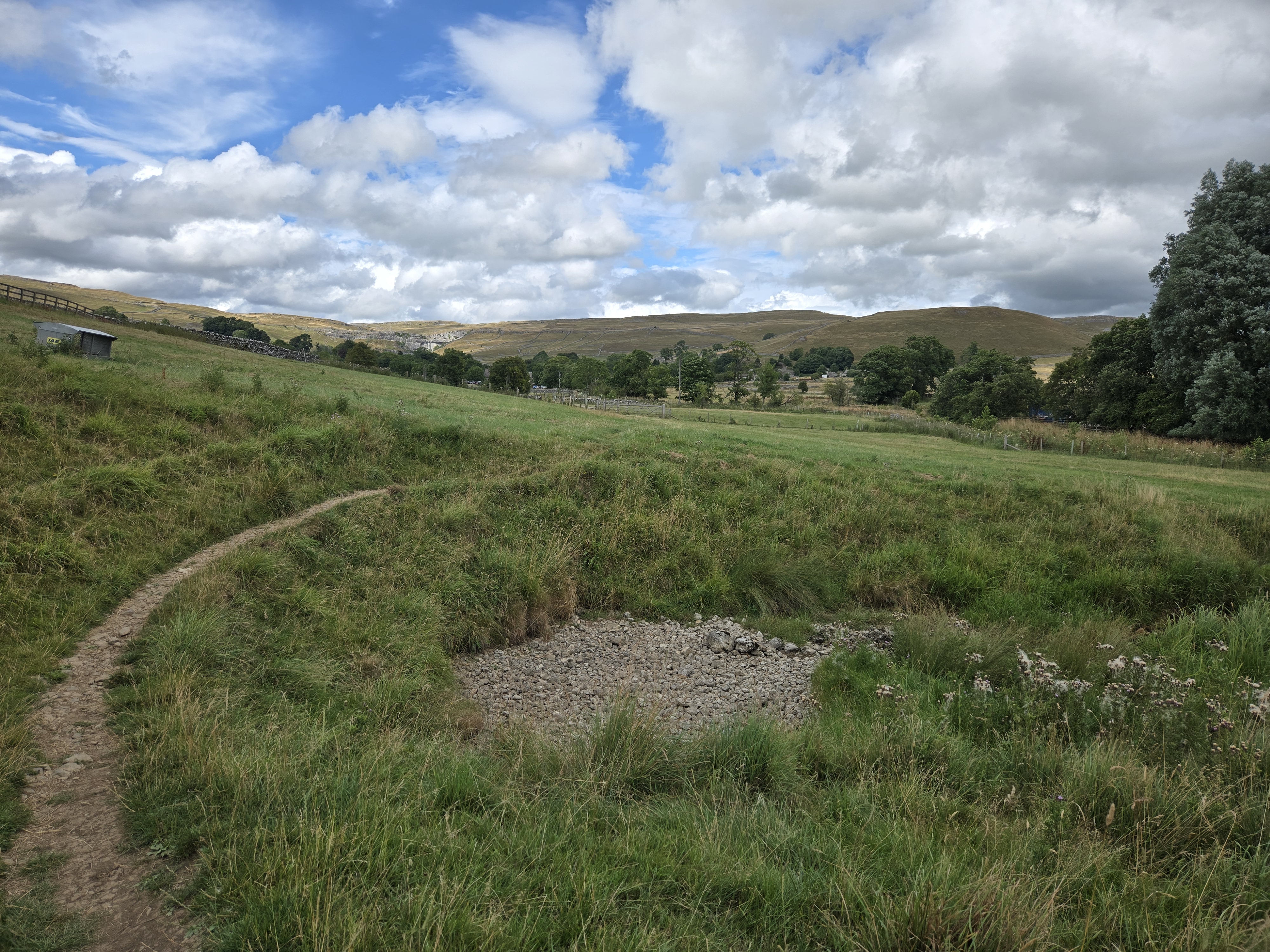 dry stream bed in field