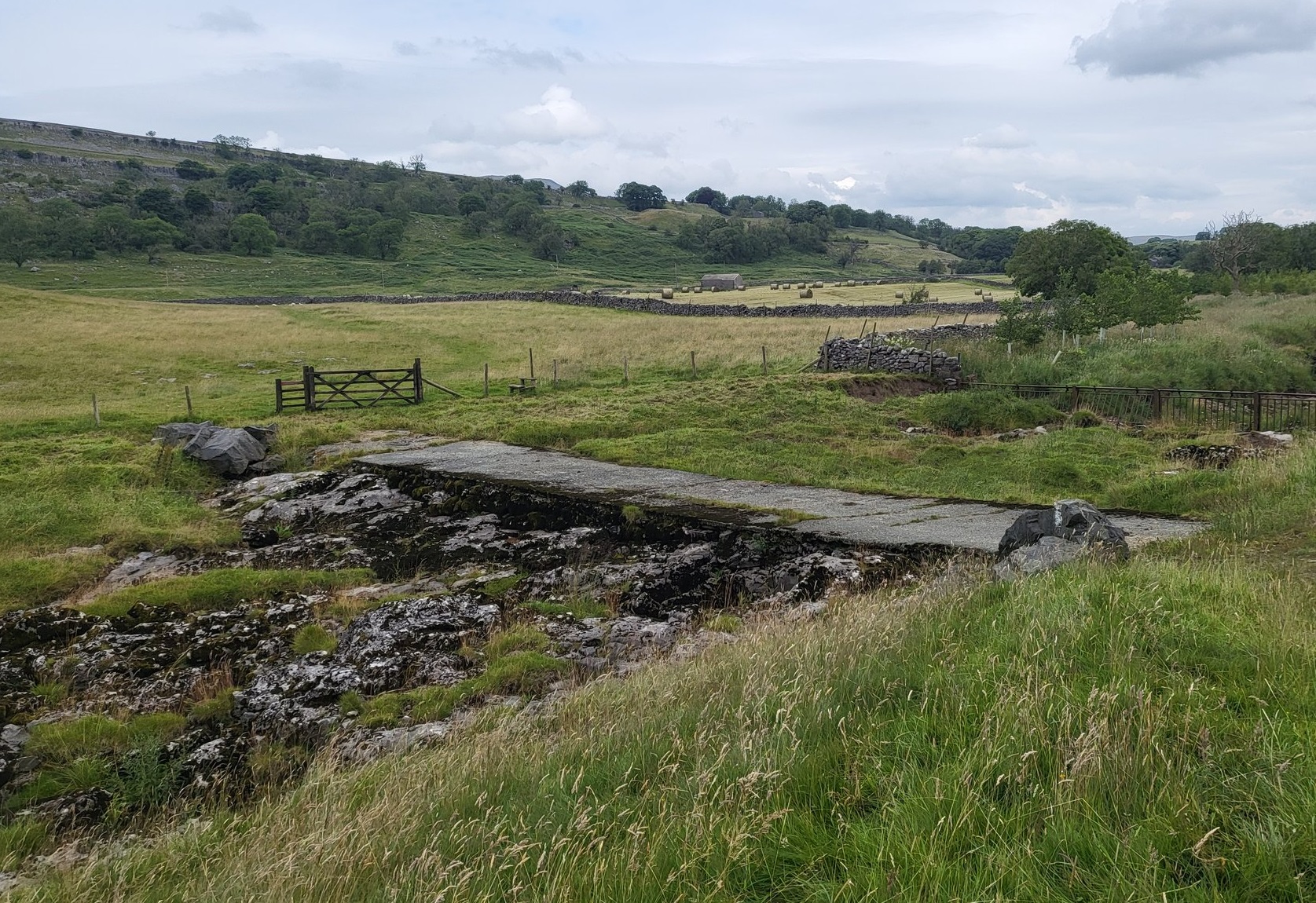 Farm track passing over limestone rocks