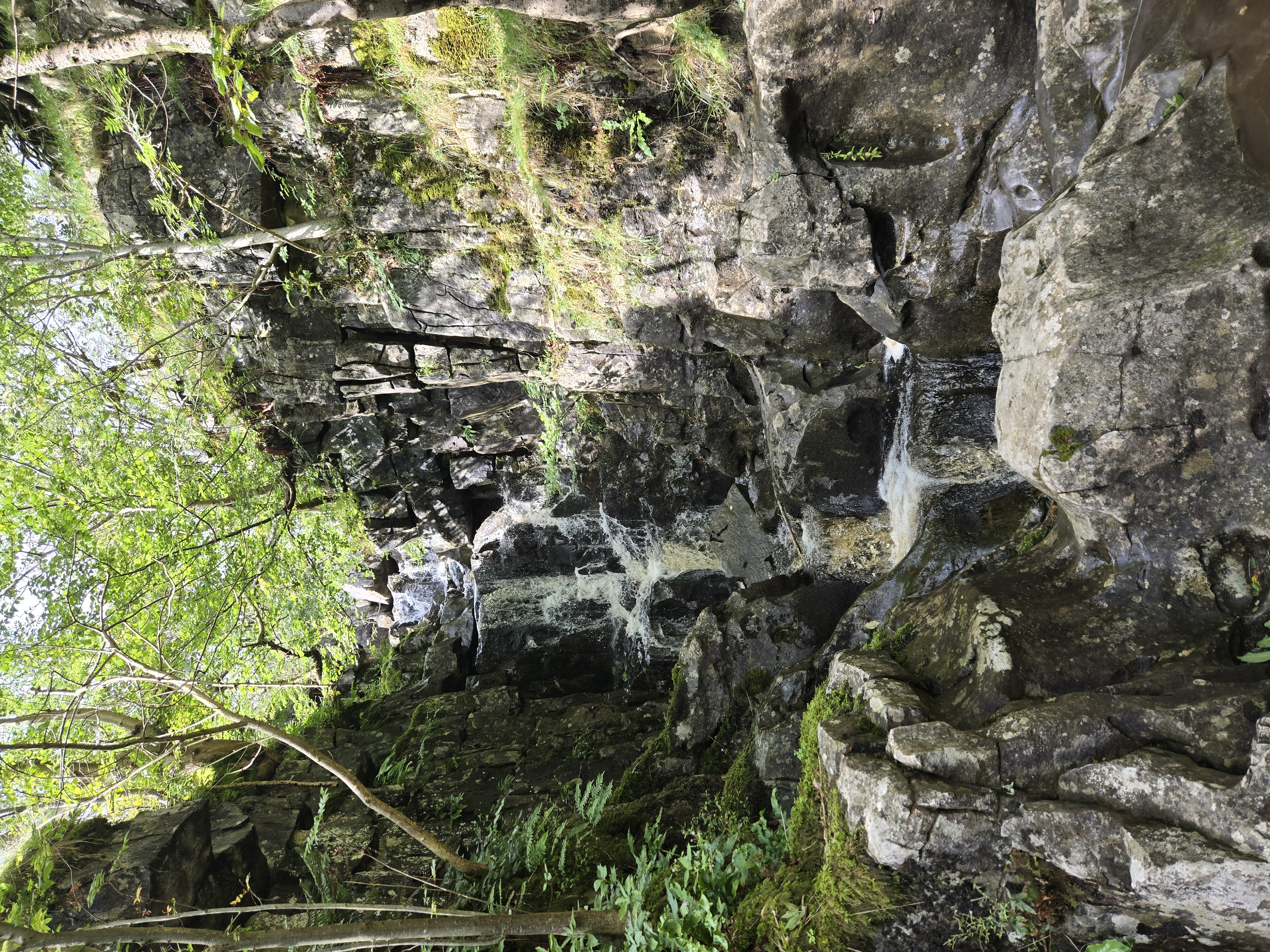 Waterfall in narrow ravine